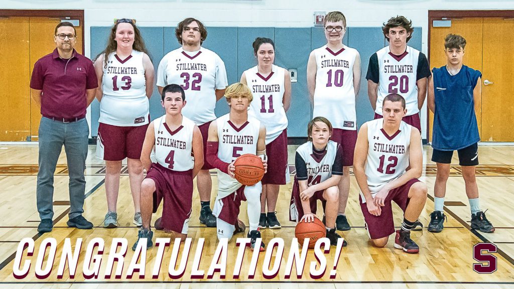 Unified basketball players standing for a team photo with their coach on the left. "Congratulations" is in white letters on the bottom, along with the Stillwater CSD "S" logo.